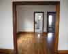 View from Front Room through Dining Room and into Kitchen and Bathroom via the hallway